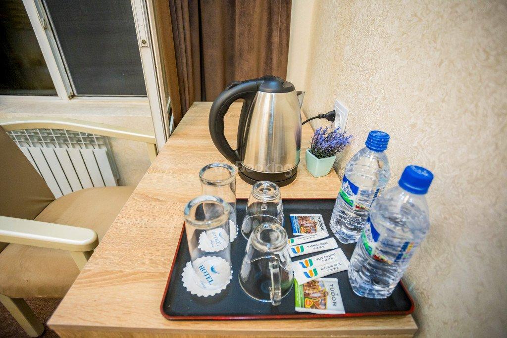 Wantong Hotel Tasken Kültér fotó