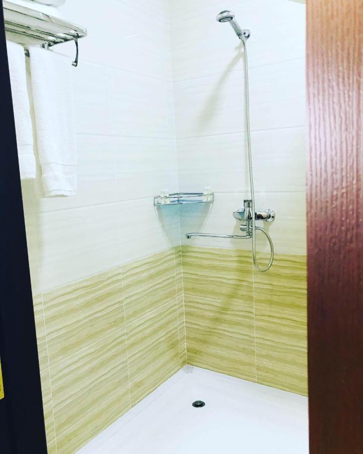 Wantong Hotel Tasken Kültér fotó