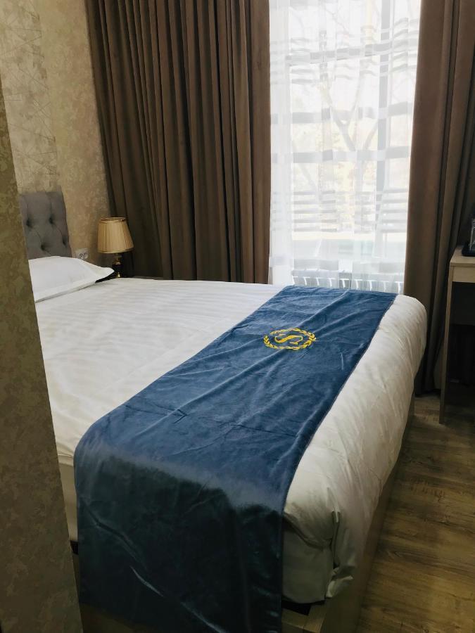 Wantong Hotel Tasken Kültér fotó