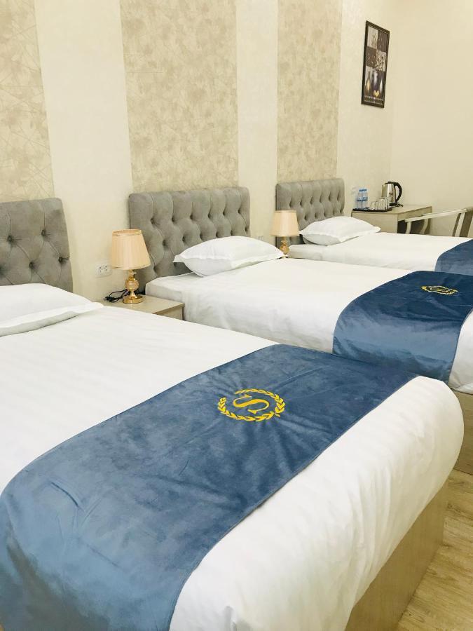 Wantong Hotel Tasken Kültér fotó