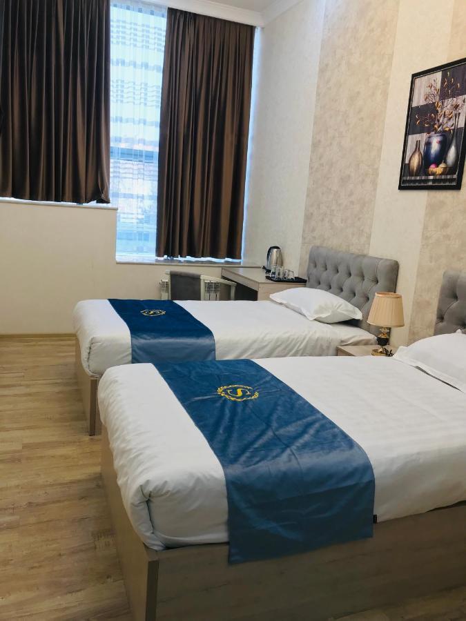 Wantong Hotel Tasken Kültér fotó