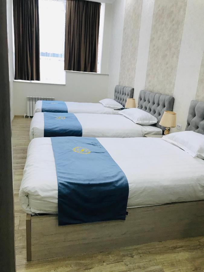Wantong Hotel Tasken Kültér fotó