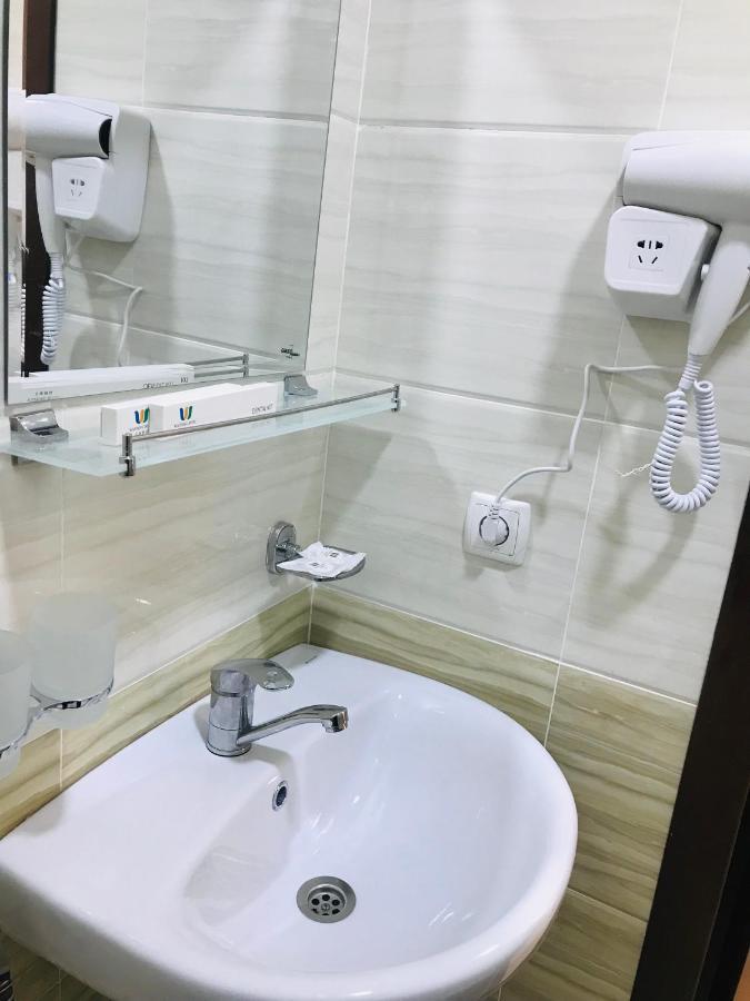 Wantong Hotel Tasken Kültér fotó