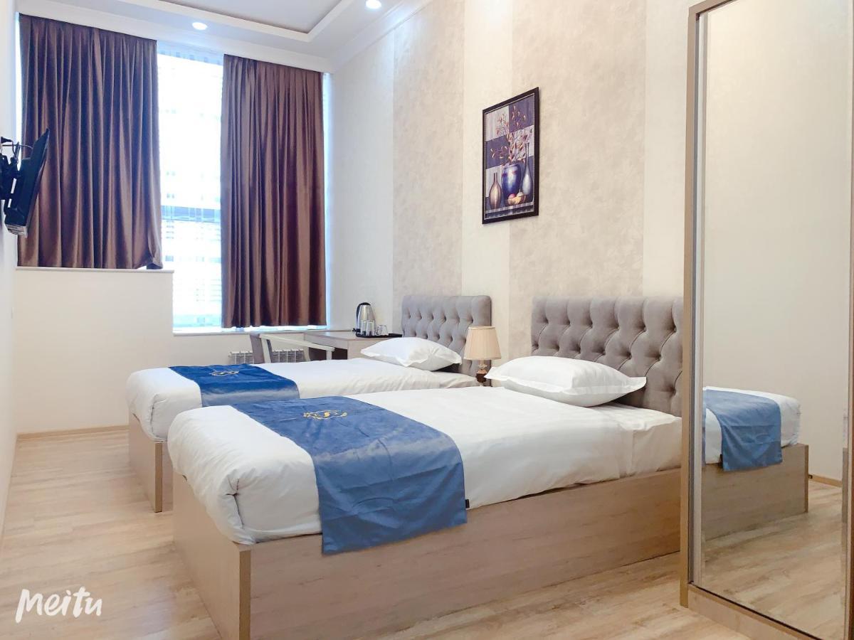 Wantong Hotel Tasken Kültér fotó