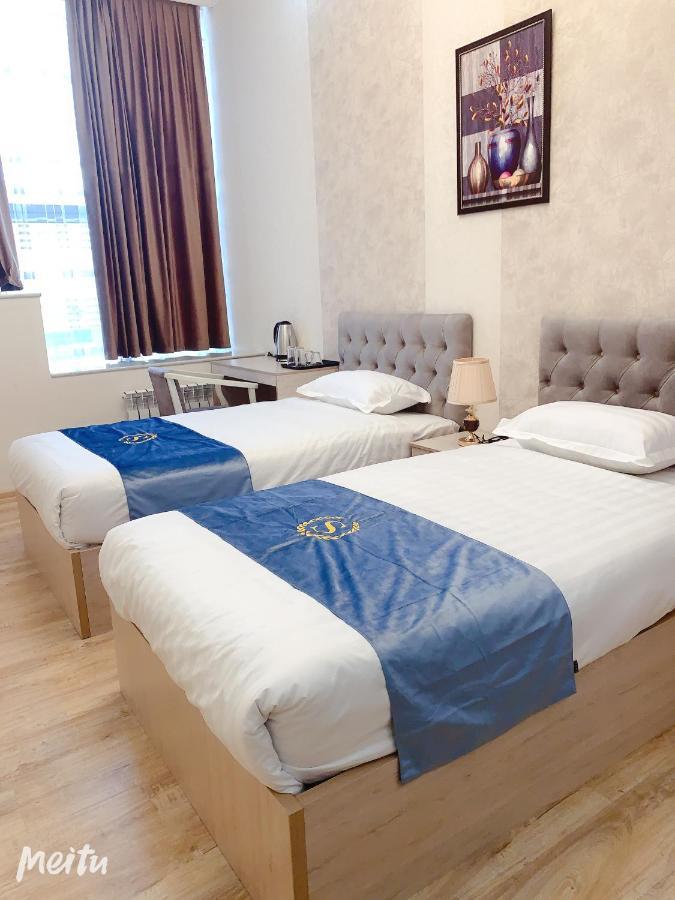Wantong Hotel Tasken Kültér fotó